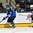 GRAND FORKS, NORTH DAKOTA - APRIL 23: Finland's Kasper Kotkansalo #36 skates with the puck while USA's William Lockwood #10 chases him down during semifinal round action at the 2016 IIHF Ice Hockey U18 World Championship. (Photo by Matt Zambonin/HHOF-IIHF Images)

